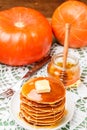 Homemade pumpkin pancakes with butter and honey Royalty Free Stock Photo