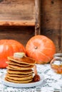Homemade pumpkin pancakes with butter and honey Royalty Free Stock Photo