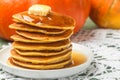 Homemade pumpkin pancakes with butter and honey Royalty Free Stock Photo