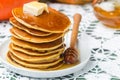 Homemade pumpkin pancakes with butter and honey Royalty Free Stock Photo