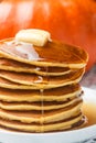 Homemade pumpkin pancakes with butter and honey Royalty Free Stock Photo