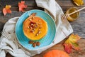 Homemade pumpkin pancakes with pecan nuts and honey Royalty Free Stock Photo