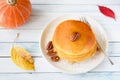 Homemade pumpkin pancakes with pecan nuts and honey Royalty Free Stock Photo