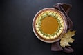 Homemade pumpkin pie with cinnamon on dark wooden background. Royalty Free Stock Photo