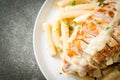 Quadrotto penne pasta white creamy sauce with grilled chicken Royalty Free Stock Photo