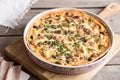 Homemade quiche lorraine with chicken, mushrooms, cheese and bacon. Tart with chicken. Chicken pie. Mushroom pie Royalty Free Stock Photo