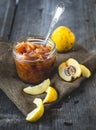 Homemade quince confiture in a glass jar
