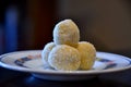 A homemade raffaello with grains of coconut above.