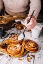 Homemade raisin roll pastry with vanilla icing
