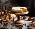 Homemade raspberry sliced biscuit cake with white cream on top on wooden cake stand