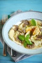 Homemade ravioli stuffed with egg yolk, ricotta and black truffles