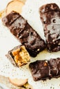 Homemade raw chocolate candy snickers bars. Vegan dessert. Royalty Free Stock Photo