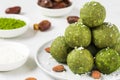 Homemade raw energy balls made of green matcha tea, dates and nuts. Healthy vegan dessert food Royalty Free Stock Photo