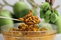 Homemade raw mango pickle prepared in India during summer season Royalty Free Stock Photo