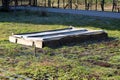 Homemade rectangle makeshift small greenhouse used to grow organic lettuce in part of local home urban garden Royalty Free Stock Photo