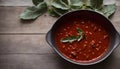 Homemade Red Sauce in Bowl on Rustic Wooden Table, Copy Space Royalty Free Stock Photo