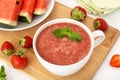 Homemade red smoothie with strawberry and watermelon in white cup