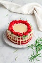 Homemade red velvet cake with white chocolate, fresh strawberries and rosemary Royalty Free Stock Photo