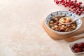 Homemade red and white tangyuan with syrup soup, dried longan pulp, red dates for Winter solstice Royalty Free Stock Photo