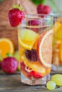 Homemade refreshing fruit sangria or punch with champagne, strawberries, oranges and grapes Royalty Free Stock Photo