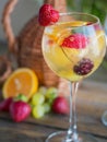 Homemade refreshing fruit sangria or punch with champagne, strawberries, oranges and grapes Royalty Free Stock Photo