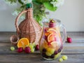 Homemade refreshing fruit sangria or punch with champagne, strawberries, oranges and grapes Royalty Free Stock Photo