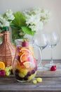 Homemade refreshing fruit sangria or punch with champagne, strawberries, oranges and grapes Royalty Free Stock Photo