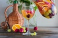 Homemade refreshing fruit sangria or punch with champagne, strawberries, oranges and grapes Royalty Free Stock Photo