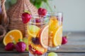 Homemade refreshing fruit sangria or punch with champagne, strawberries, oranges and grapes Royalty Free Stock Photo