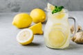 Homemade refreshing summer lemonade drink with lemon slices, ginger and ice Royalty Free Stock Photo