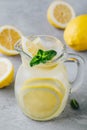 Homemade refreshing summer lemonade drink with lemon slices, ginger and ice Royalty Free Stock Photo