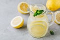 Homemade refreshing summer lemonade drink with lemon slices, ginger and ice Royalty Free Stock Photo