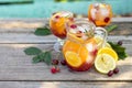 Homemade refreshing wine sangria or punch with fruits in glasses. Sangria cocktails with fresh fruits, berries and rosemary. Royalty Free Stock Photo