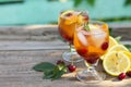 Homemade refreshing wine sangria or punch with fruits in glasses. Sangria cocktails with fresh fruits, berries and rosemary. Royalty Free Stock Photo
