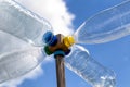 Homemade repeller-windmill from moles and birds made from plastic bottles in the country