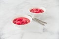 Homemade Rhubarb Compote on White Marble Royalty Free Stock Photo