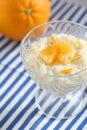 Homemade rice porridge with orange