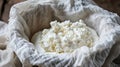 Homemade ricotta cheese draining in a colander with cheesecloth on a wooden table. Ai Generative