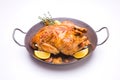 Homemade roasted chicken with lemon on white Royalty Free Stock Photo