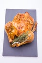 Homemade roasted chicken with lemon on white Royalty Free Stock Photo