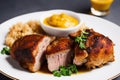 Homemade roasted pork knuckle served with mustard on the plate Royalty Free Stock Photo