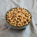 Homemade Roasted and Salted Cashews in a Bowl, side view Royalty Free Stock Photo