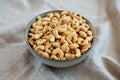 Homemade Roasted and Salted Cashews in a Bowl, side view. Close-up Royalty Free Stock Photo