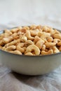 Homemade Roasted and Salted Cashews in a Bowl, side view. Close-up Royalty Free Stock Photo