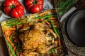 Homemade Roasted Stuffed Chicken Vegetables in Baking Form Yams Carrots Asparagus Onions Herbs Rosemary Thyme. Festive Dinner Royalty Free Stock Photo