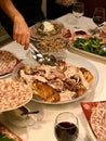 Homemade Roasted Thanksgiving Day Turkey with all the Sides at Dinner Table. Royalty Free Stock Photo