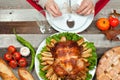 Homemade roasted whole turkey on wooden table for Thanksgiving. Royalty Free Stock Photo