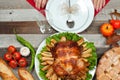 Homemade roasted whole turkey on wooden table for Thanksgiving. Royalty Free Stock Photo