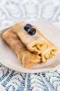 Homemade rolled pancakes with blueberry Royalty Free Stock Photo