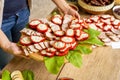 Homemade Romanian food platter with peppers stuffed with chees and ham